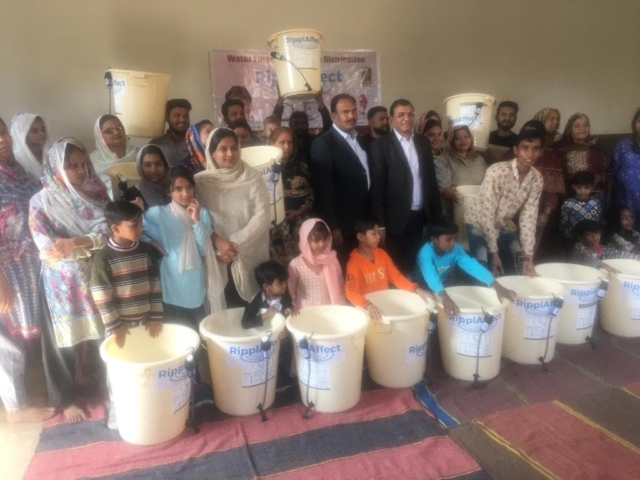 Pakistan - group photo with bucket filters
