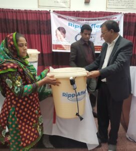 Pakistan - woman receiving filter