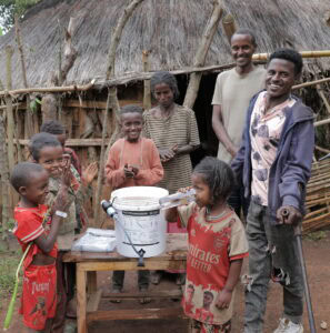 Ethiopia Family - Small Girl drinks water - 2025 Square