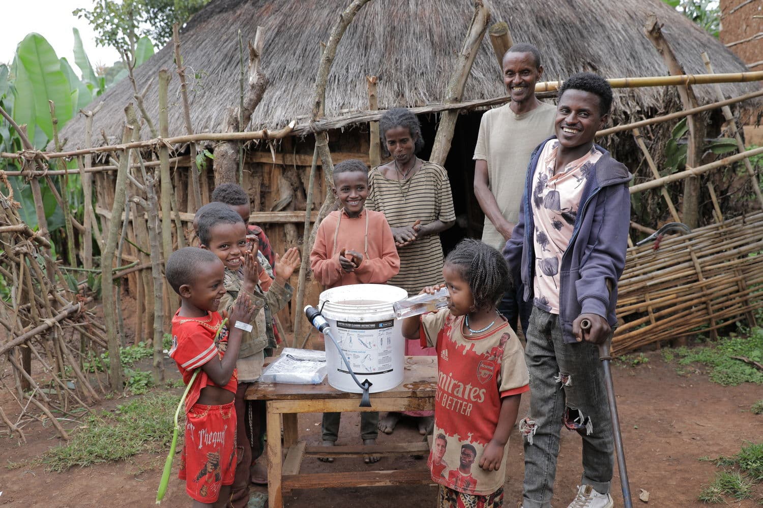 Ethiopia Family - Small Girl drinks water - 2025